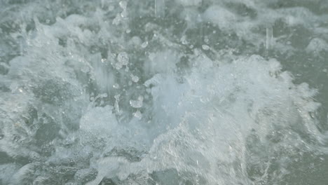 Gushing-water-surface-in-slow-motion,-120-fps-4k