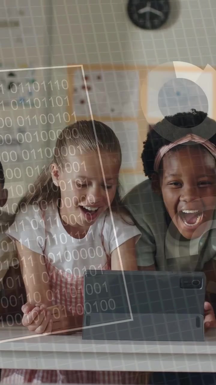 Vertical video: Two students tapping tablet launching education demo, binary HUD guiding learning