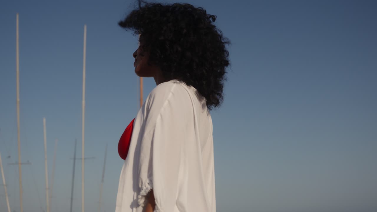 Woman enjoying summer vacation at the beach