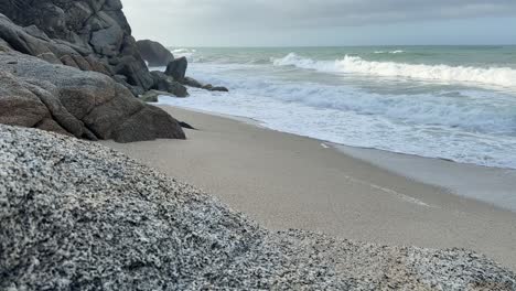 serene coastal beauty meets rugged rocks