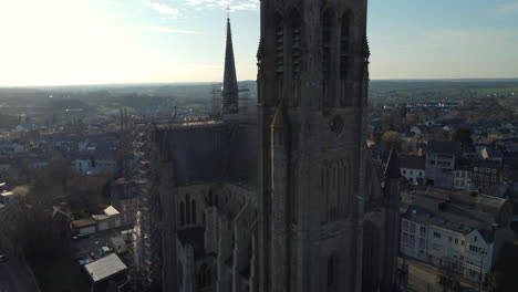 aerial view of a church under repair in a european town