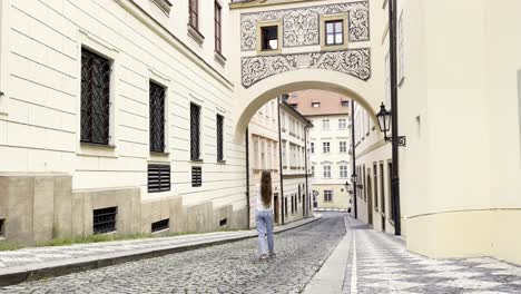 A young woman walks down the street of prague taki 4k 2025 08 04 22 04 54 utc.mov | ancient, apartment, background, backlit