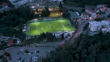 view of a football field from a drone at dusk