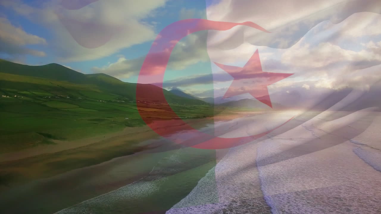composición digital de ondear la bandera de argelia contra la vista aérea de la playa y las olas del mar