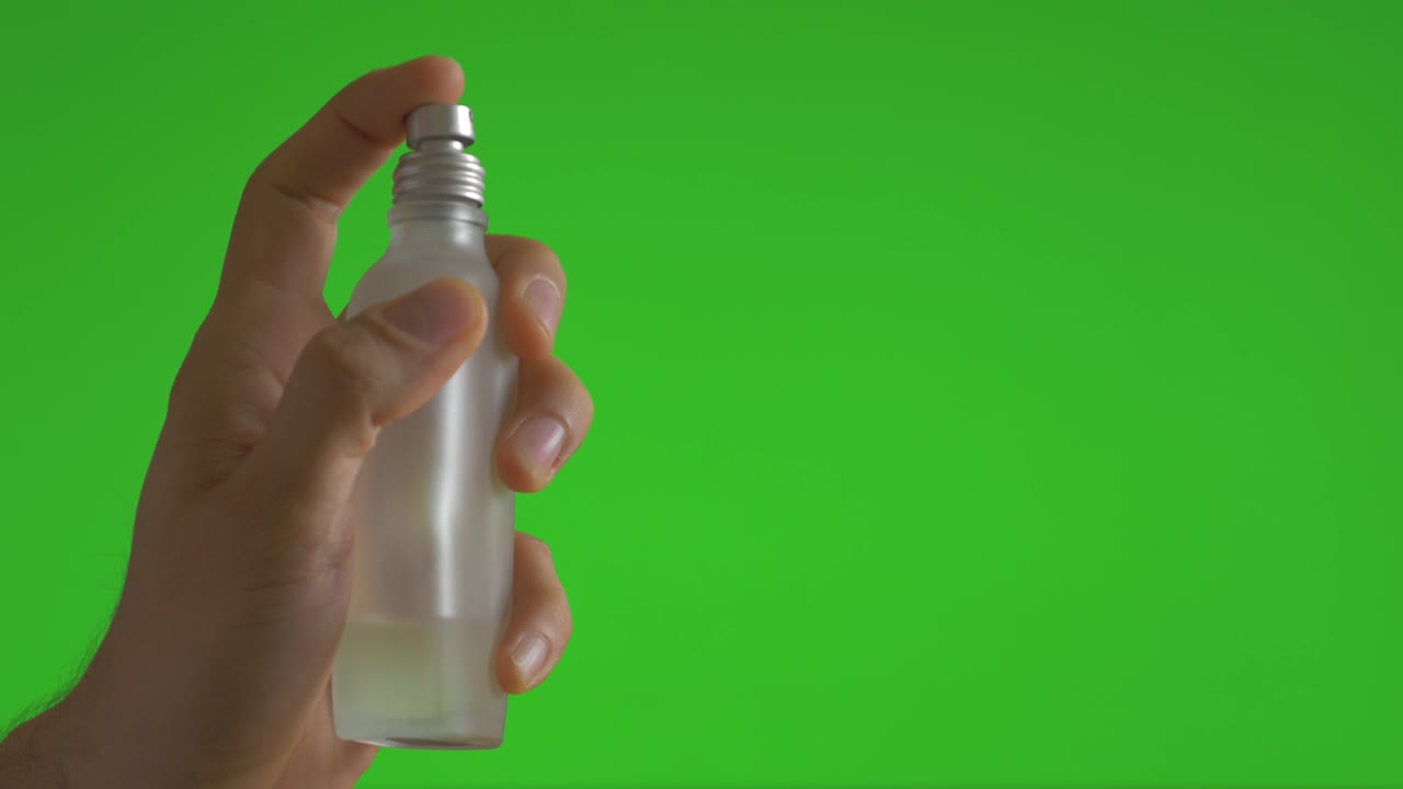 Flacone di profumo su green screen