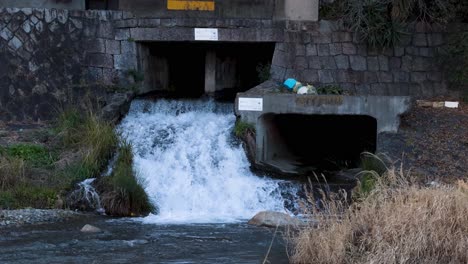 waterfall with garbage flowing in tokyo