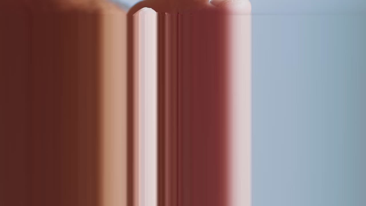 Close up gold and silver coins in hand. Slow motion.