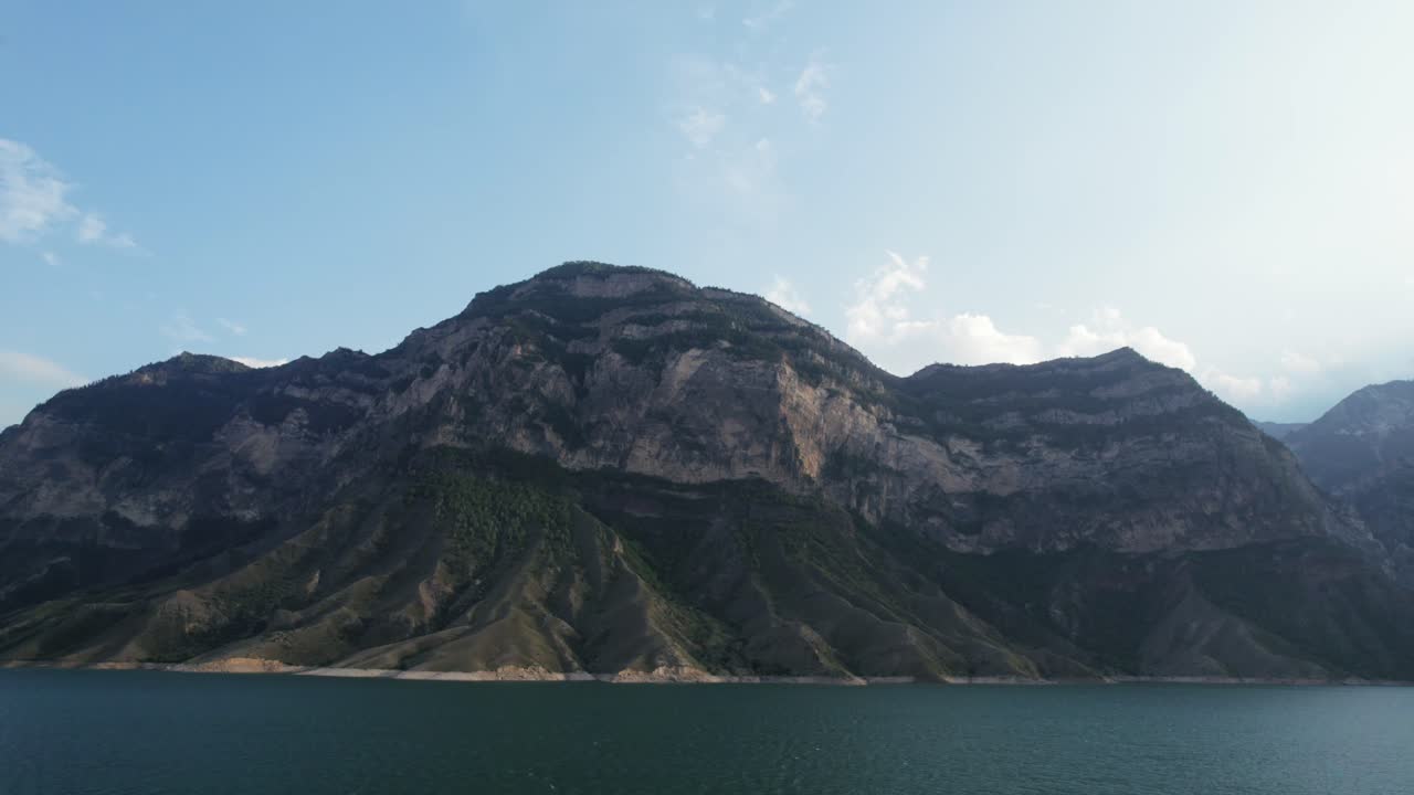 Mountainous landscape with lake and dam
