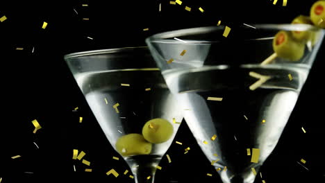 martini glasses with olives and golden confetti animation