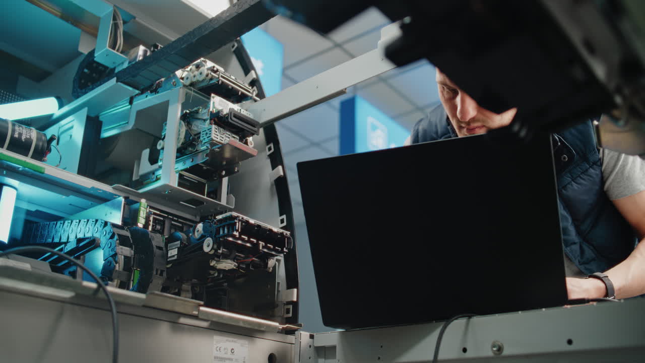 ATM Repair Technician Working on a Machine