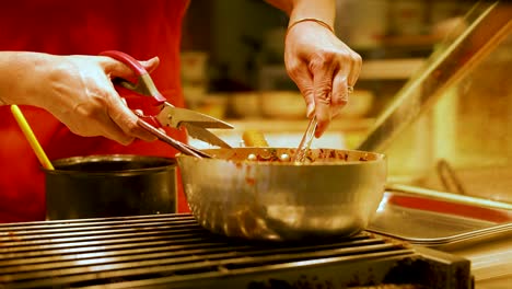 chef preparing food with precision and skill