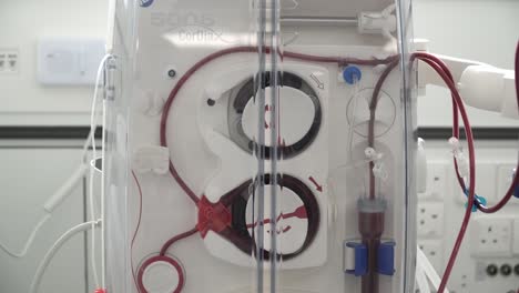 close-up of a blood dialysis machine pumping to filter blood