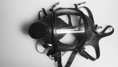 Gas-Mask-on-White-Surface-Static-Shot-01