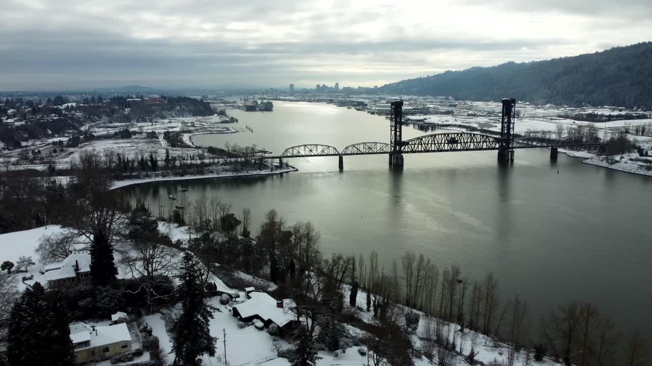 US, Oregon, Portland, St Johns, 2025-02-14 - Drone view of the Train Bridge in the snow.