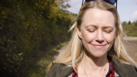 woman with sunglasses in nature