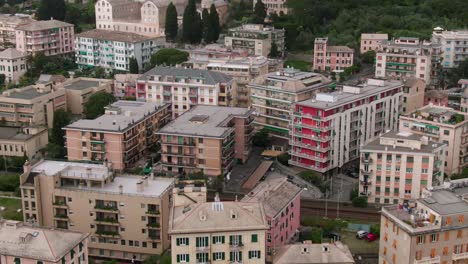 apartment building district of genoa city, cinematic aerial drone view