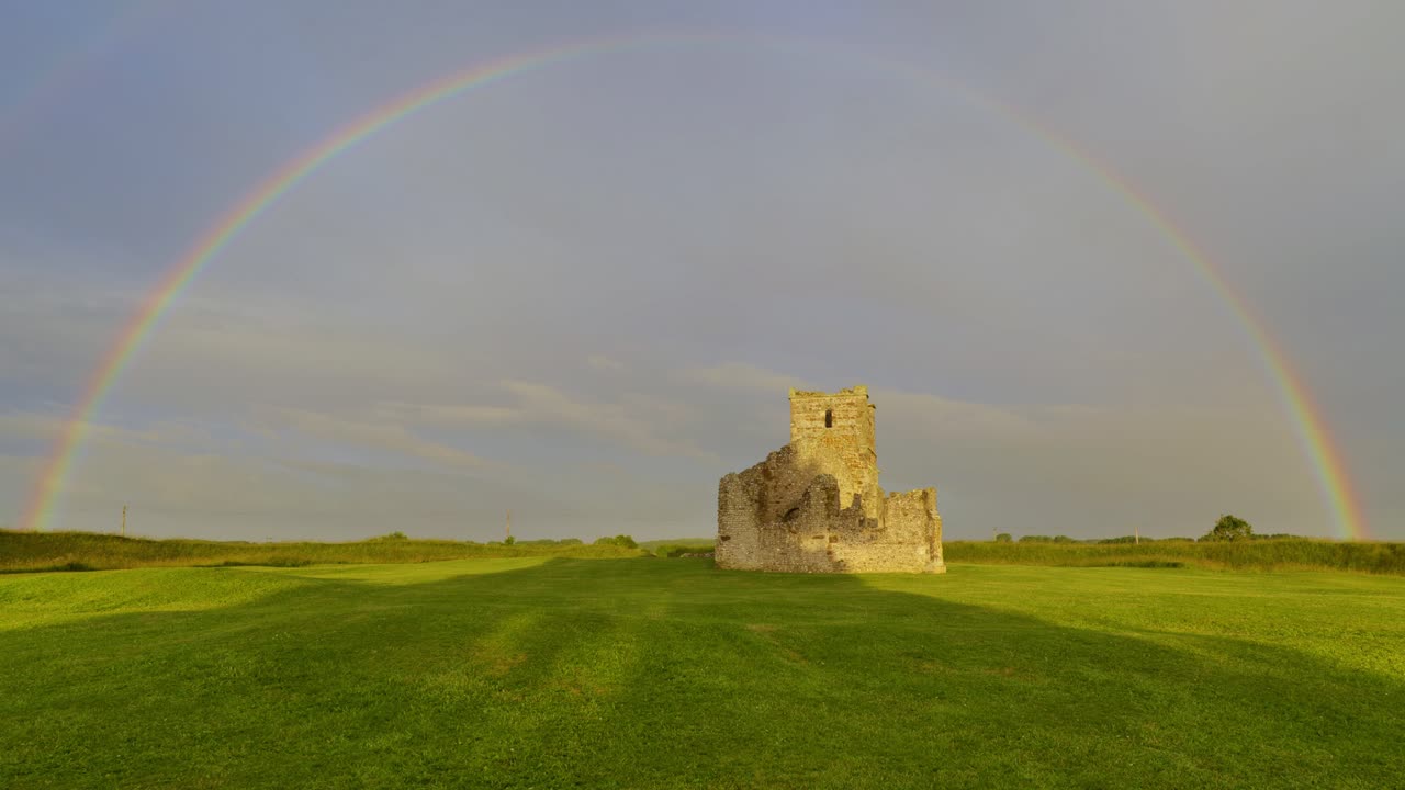 Rainbow over Knowlton Church, Dorset, England.