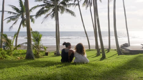 young couple sitting on the grass