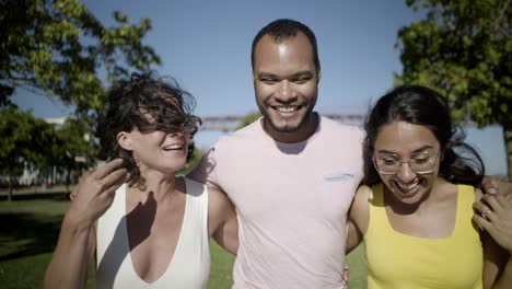 Happy-young-friends-walking-outdoor