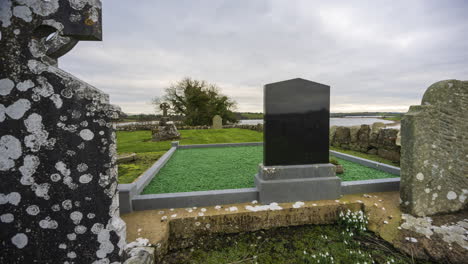 Motion-time-lapse-of-historical-abbey-and-graveyard-in-rural-Ireland-during-a-cloudy-day