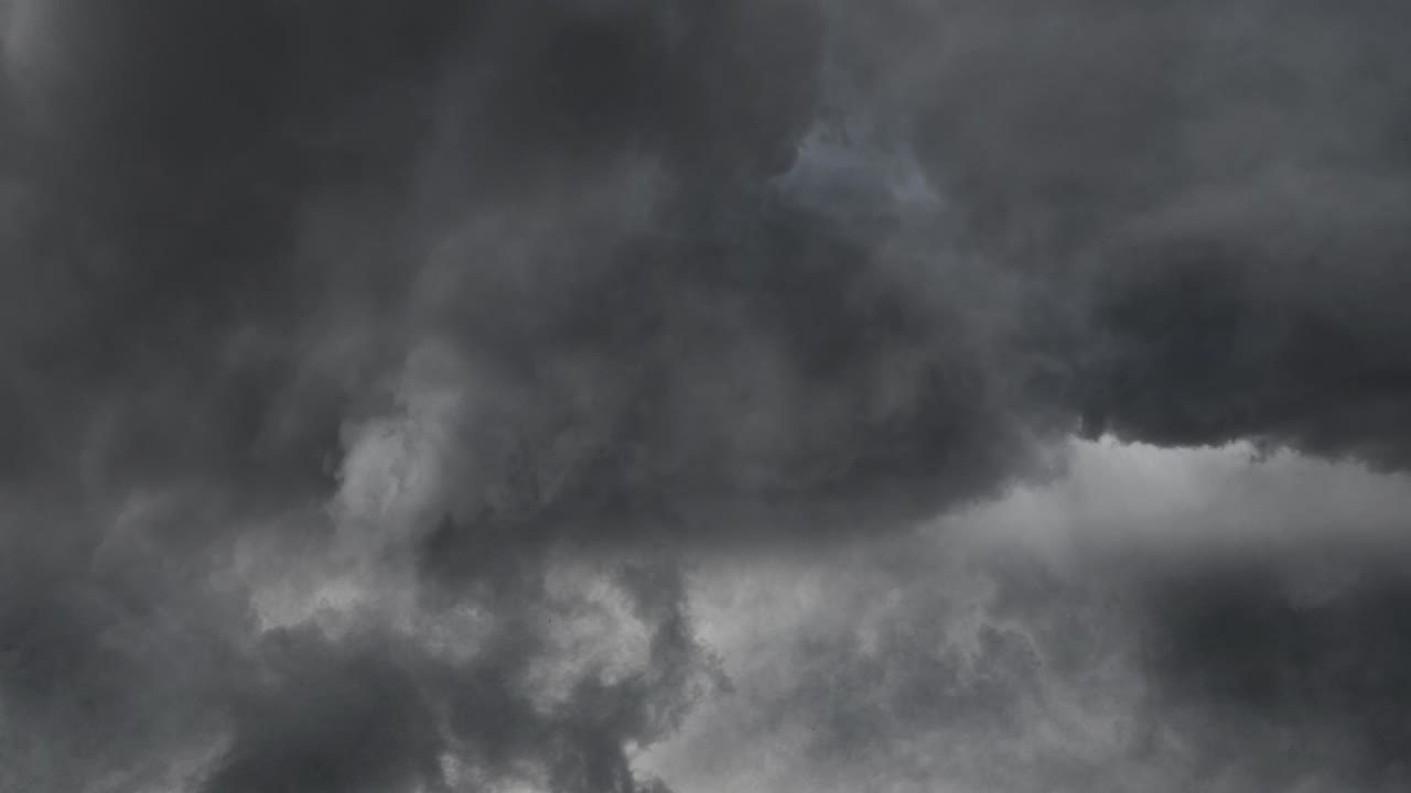 seamless looping motion background shows a dramatic lightning storm