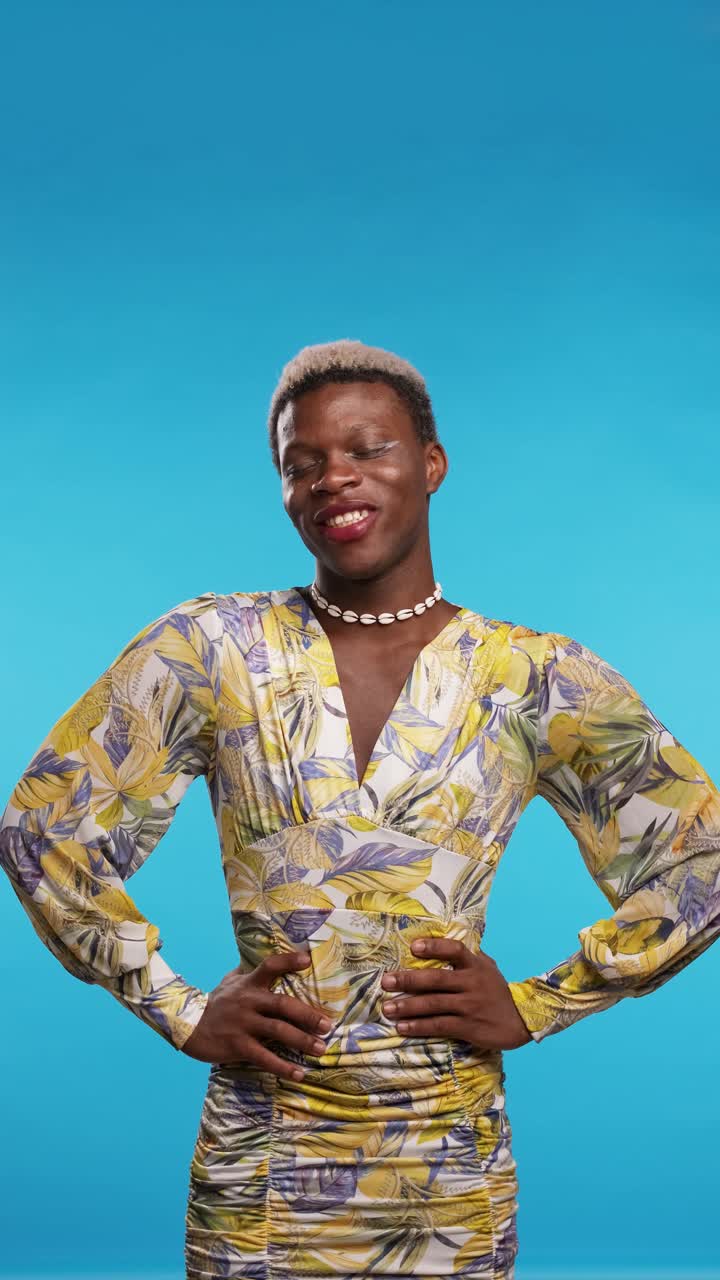 Confident transgender ethnic person on blue background