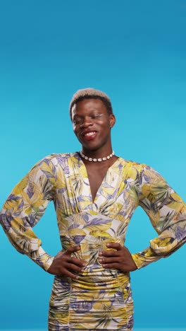 confident transgender ethnic person on blue background