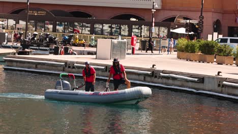 two people docking a boat in monte carlo