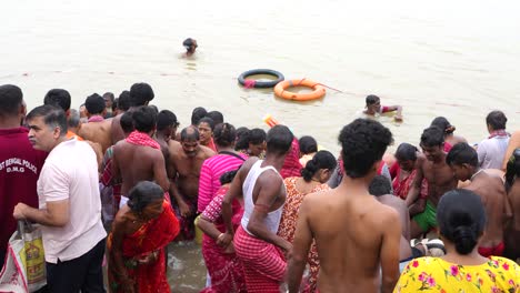 on the eve of durga puja, hindus gather at ganges for bathing and tarpan on mahalaya day.