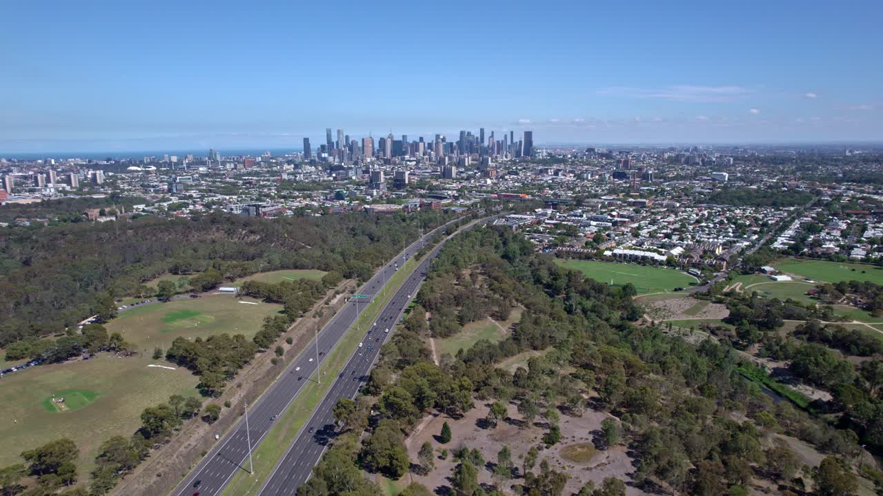 Aerial view looking west over the Eastern Freeway to the Melbourne city skyline, Victoria, Australia. March 2025