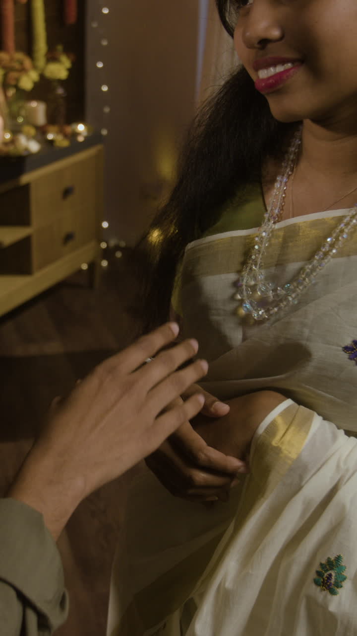 Woman in traditional Indian sari with jewelry