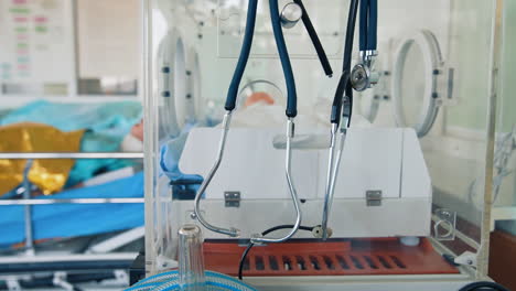 medical mannequin on bed. practicing with medical simulation mannequin in hospital. doll in incubation department concept