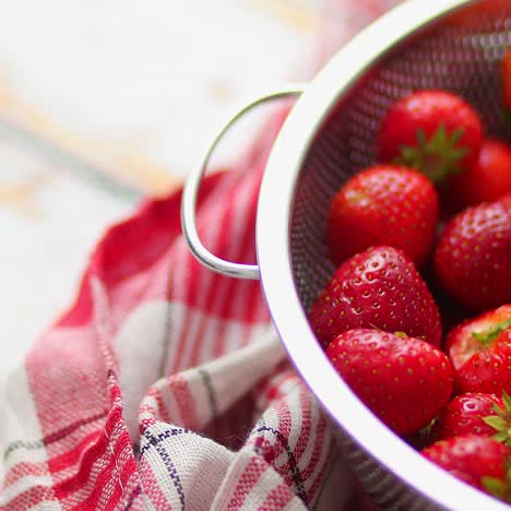 Delicious-healthy-fresh-strawberries-placed-in-metal-strainer--Organic-natural-food-concept