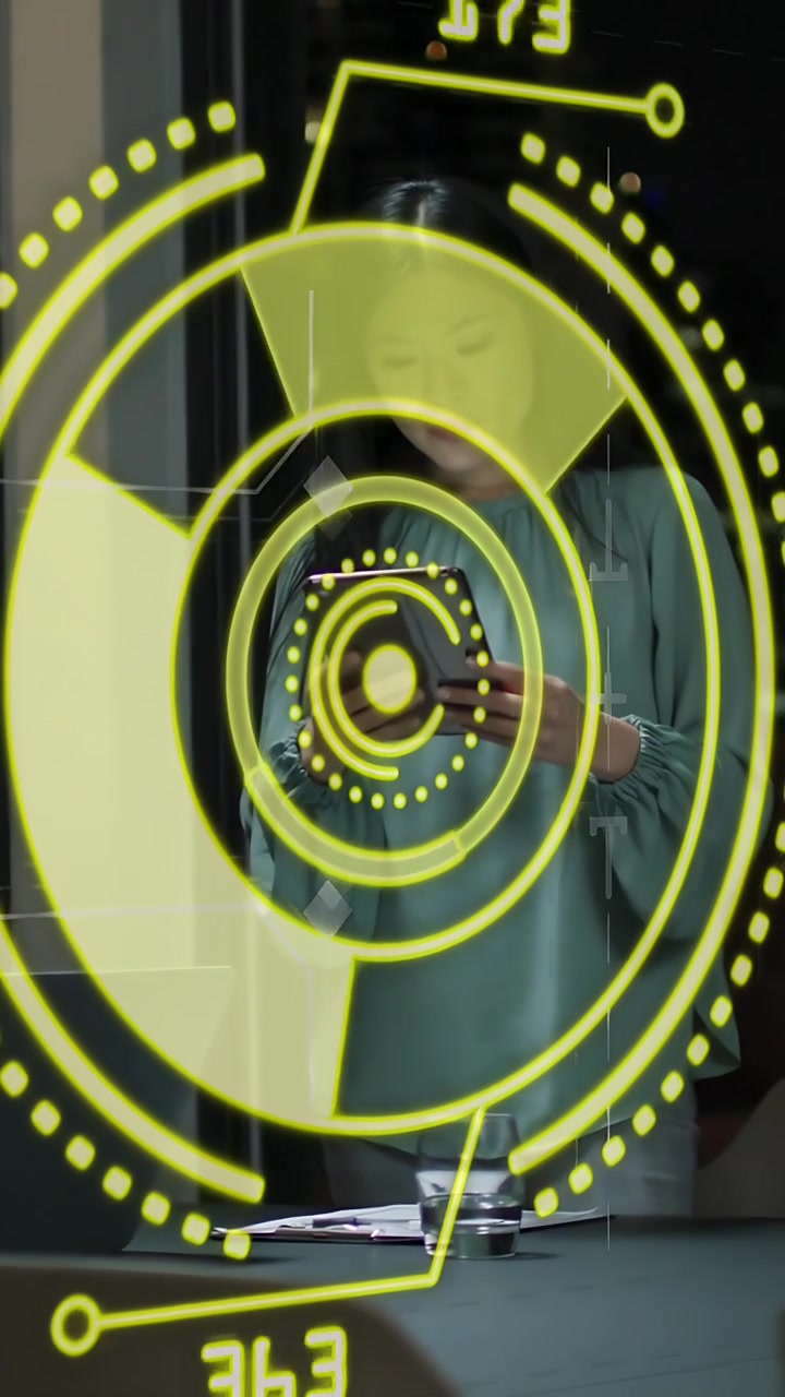 Vertical video: Woman tapping phone, looking up and speaking as yellow HUD updating business data