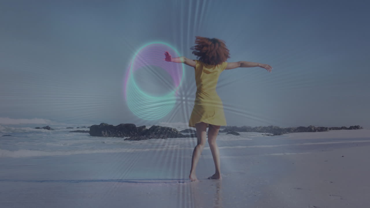 Dancing joyfully on beach, woman in yellow dress with colorful animation effects