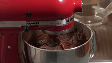 Male-preparing-a-chocolate-cake