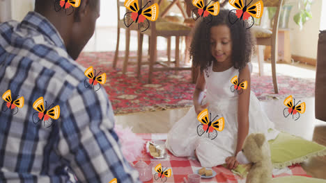 Animación-De-Flores-Sobre-Un-Feliz-Padre-E-Hija-Afroamericanos-Jugando-En-Casa