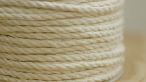 rolled up white cotton rope