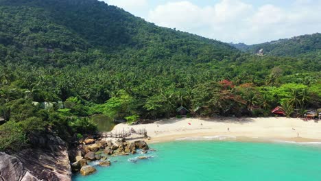 River-and-a-wooden-deck-on-the-Haad-Than-Sadet-Beach,-Koh-Phangan,-Thailand