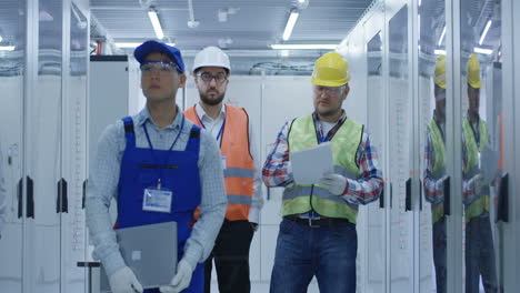 data center technicians inspecting equipment