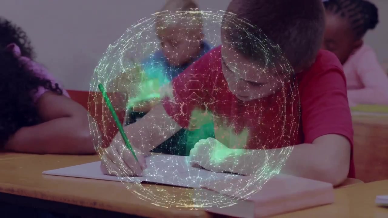 Boy in red doing work with green pencil in classroom, animated globe appearing over desk, morphing