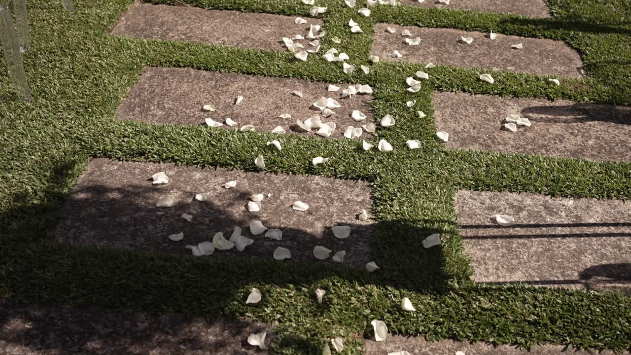 White Flower Petals on a Stone Path - Wedding Aisle Decor