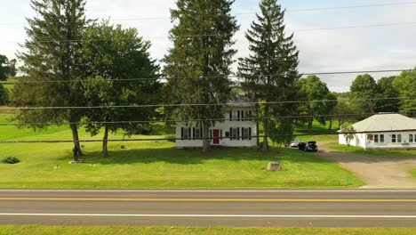 drone flying over the corn field in front of the original historic house of josiah stowell friend of joseph smith hired him for money or treasure digging in the early 1820s mormon origins