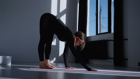 woman doing yoga plank pose