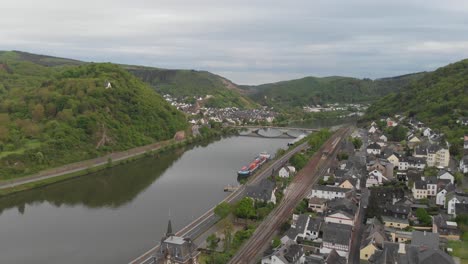 Aerial-of-a-settlement-in-Treis-Karden-located-on-the-riverbank,-Germany