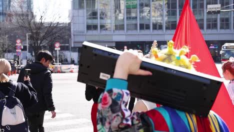 protesters with flags filmed by news crew outdoors