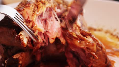 roasted pork knuckle carving