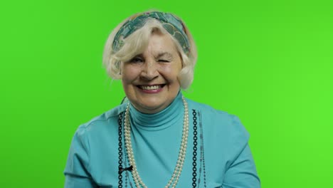 elderly stylish trendy grandmother. caucasian woman posing. chroma key