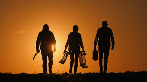 farmers at sunset