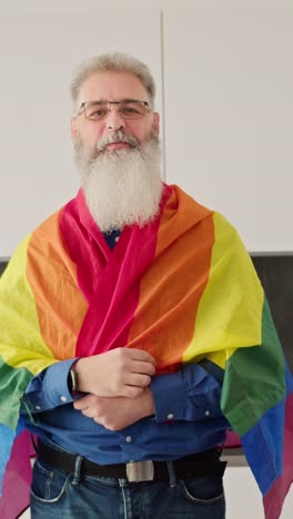 older man with pride flag